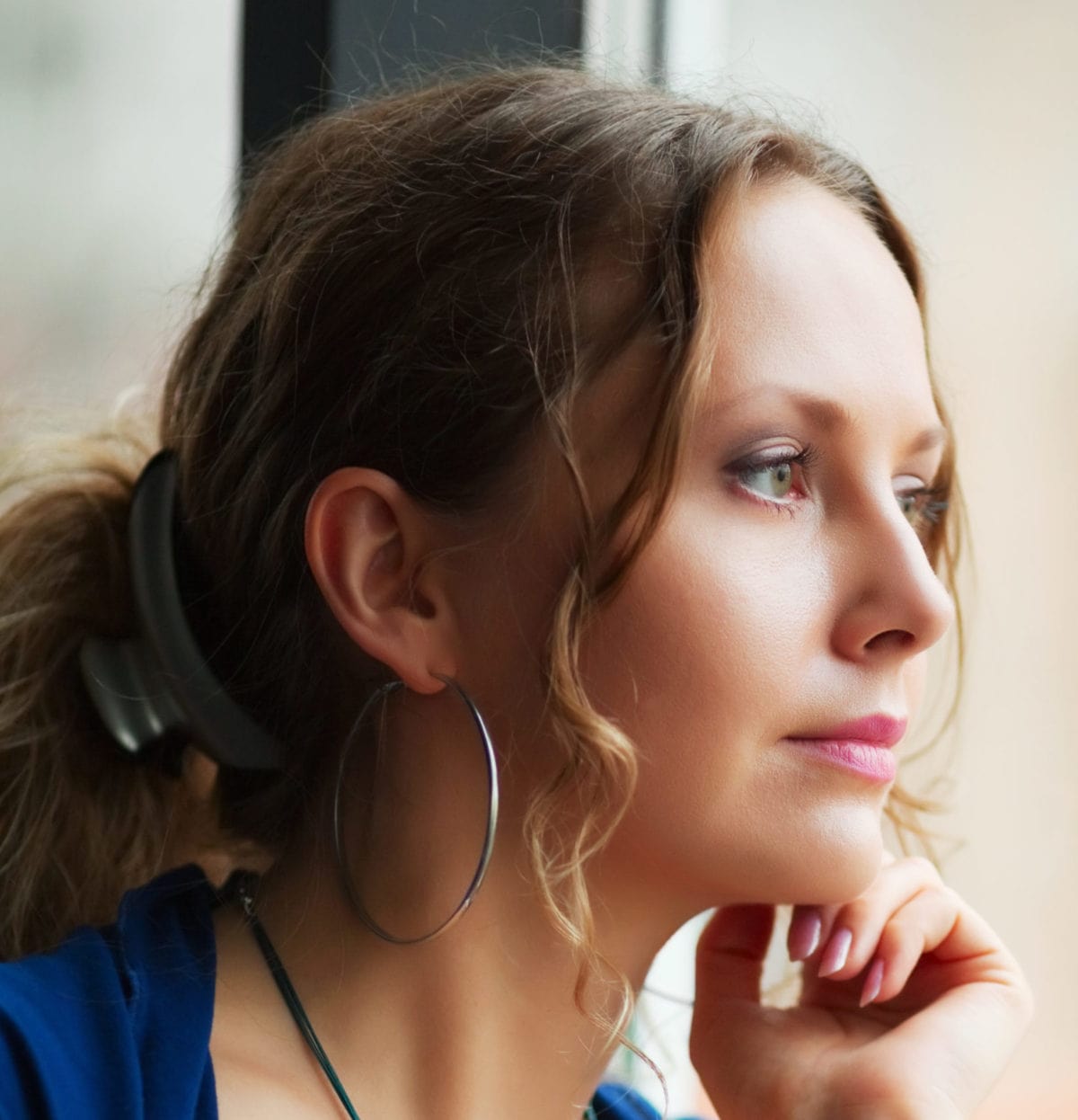 A dental patient waiting for her appointment at Park Dental Associates.