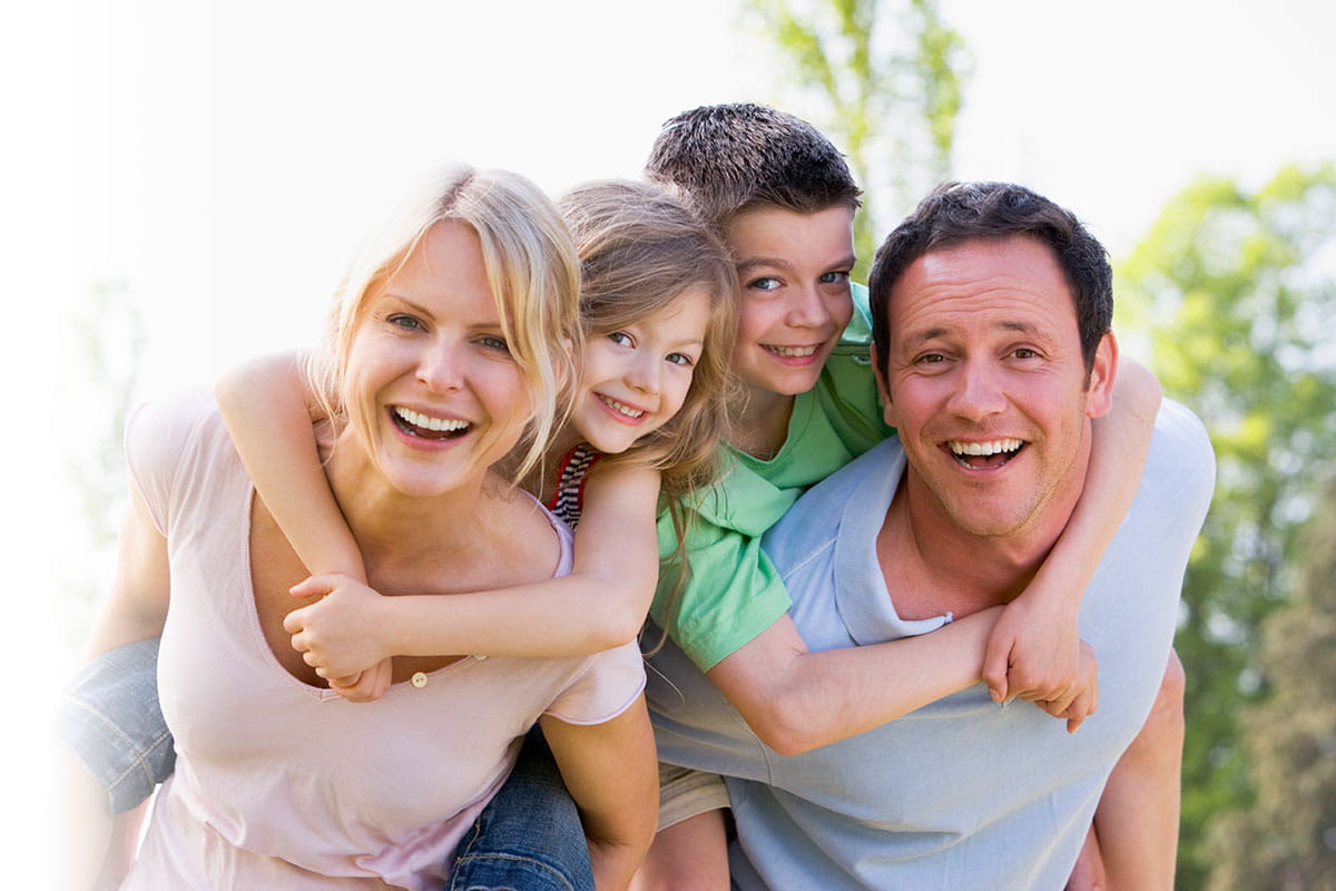 A joyful family after a dental exam in Princeton Park, New Jersey